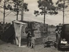 Migrant citrus worker and his family, Winterhaven, Florida, 1937